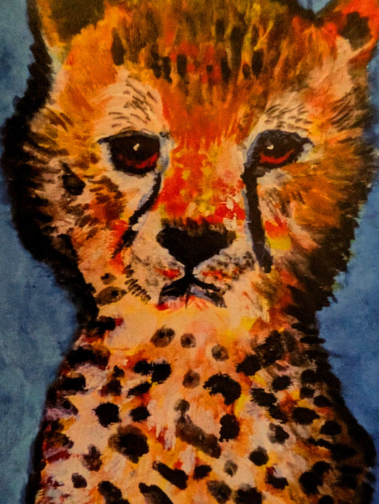 Artistic depiction of a leopards face on a blue background